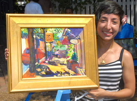 Young artist flashes winning smile